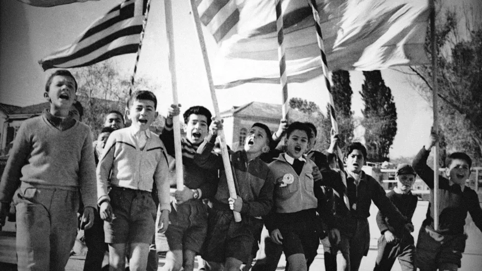 Ανόρθωση/«Με τη βοήθεια του Θεού, με πίστη εις τον τίμιο αγώνα μας»