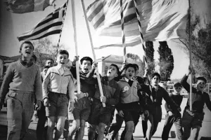 Ανόρθωση/«Με τη βοήθεια του Θεού, με πίστη εις τον τίμιο αγώνα μας»