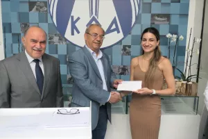 Η Κυριακή Κουττούκη παρέλαβε την επιταγή του Σχεδιασμού Χαριστικών Παροχών από τον ΚΟΑ